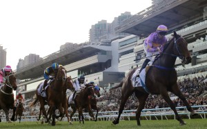 Little Paradise storms clear to win the Classic Mile under Vincent Ho. Photos: Kenneth Chan