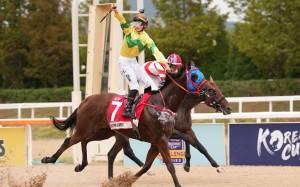 Jerry Chau celebrates his Korea Sprint win on Self Improvement. Photo: HKJC
