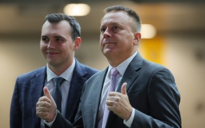 Caspar Fownes (right) and son Ronan celebrate the stable’s latest treble at the Valley. Photos: Kenneth Chan
