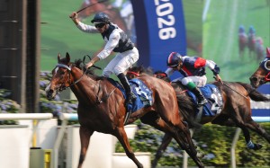 Hugh Bowman salutes after booting home Invincible Ibis in the 2026 Hong Kong Derby. Photos: Kenneth Chan