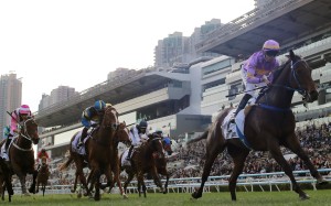 Vincent Ho guides Little Paradise to victory in the Classic Mile. Photos: Kenneth Chan