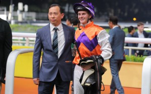 Jockey Ethan Brown celebrates his first Hong Kong win with trainer Cody Mo. Photos: Kenneth Chan