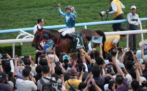 Romantic Warrior and James McDonald return after winning the Group One QEII Cup at Sha Tin. Photo: Sam Tsang