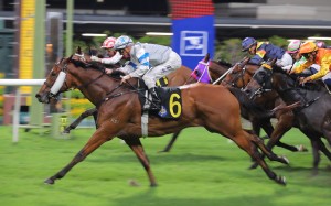 Silvery Breeze, ridden by Zac Purton, wins at Happy Valley. Photos: Kenneth Chan