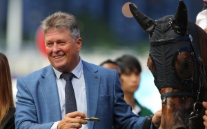 Brett Crawford celebrates a win at Happy Valley. Photos: Kenneth Chan