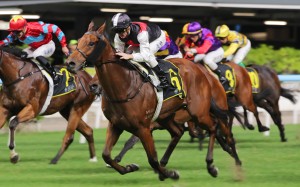 Young Arrow storms home to score under Zac Purton. Photos: Kenneth Chan