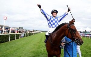 Saffie Osborne celebrates her record-breaking St Leger win on Highwayman. Photo: Dan Abraham