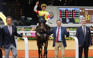 Jockey Zac Purton, trainer Douglas Whyte and connections of Live Wire celebrate his win last month. Photos: Kenneth Chan