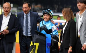 Trainer Michael Chang (second from left) and jockey Keith Yeung celebrate New Power’s win at Happy Valley. Photos: Kenneth Chan