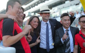 James Cummings (centre) celebrates his first Hong Kong win with wife Monica and stable staff. Photos: Kenneth Chan