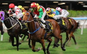 Jumbo Blessing storms home to score under Vincent Ho at Happy Valley. Photos: Kenneth Chan
