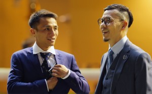 Frankie Lor (right) and his new apprentice Alfred Chan celebrate a winner on Wednesday night. Photos: Kenneth Chan