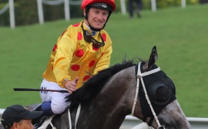 Oisin Murphy wins in Pan Sutong’s gold and red colours last year on the Tony Cruz-trained Consort at Sha Tin. Photos: Kenneth Chan