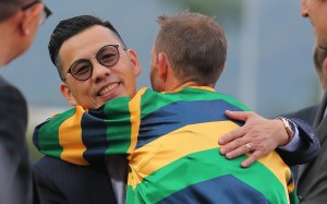 Frankie Lor gives Hugh Bowman a hug after winning the BMW Hong Kong Derby. Photos: Kenneth Chan