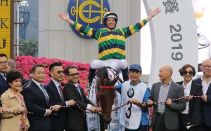 Jockey Hugh Bowman celebrates with Furore’s connections after winning the Hong Kong Derby at Sha Tin on Sunday. Photos: Kenneth Chan