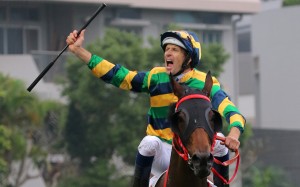 Hugh Bowman screams in delight after winning the BMW Hong Kong Derby with Furore. Photo: Kenneth Chan