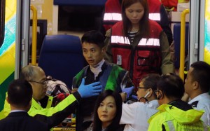 Derek Leung in the care of paramedics after his fall on Gameplayer Emperor last week. Photos: Kenneth Chan