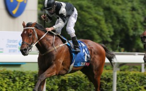 Exultant goes to the lead in the Champions & Chater Cup at Sha Tin on Sunday to win his third Group One of the season. Photos: Kenneth Chan
