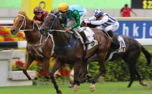 Vincent Ho coasts to victory aboard Rise High. Photos: Kenneth Chan