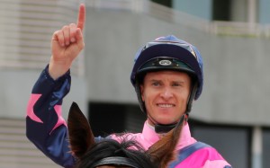 Zac Purton celebrates his 150th winner of the season. Photo: Kenneth Chan
