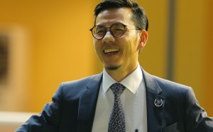 Frankie Lor shares a laugh with connections after training a winner at Happy Valley this season. Photos: Kenneth Chan