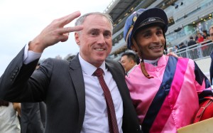 Trainer Paul O’Sullivan celebrates his treble with jockey Karis Teetan. Photos: Kenneth Chan