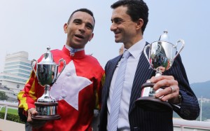 Jockey Joao Moreira and trainer Douglas Whyte celebrate Relentless Me’s victory. Photos: Kenneth Chan