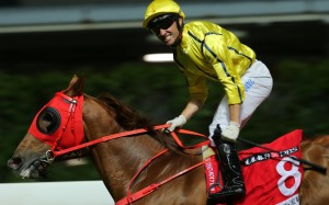Neil Callan salutes on Owners’ Star at Happy Valley on Wednesday night. Photos: Kenneth Chan