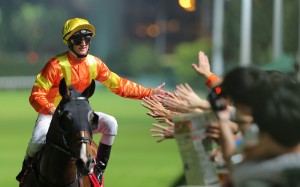 Zac Purton celebrates a winner with fans at Happy Valley earlier this month. Photos: Kenneth Chan