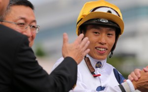 Vincent Ho celebrates a Golden Sixty win with trainer Francis Lui. Photos: Kenneth Chan
