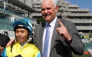 Matthew Poon celebrates with trainer David Hall after his 100th Hong Kong winner. Photos: Kenneth Chan