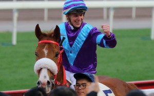 Tonny Piccone pumps his fist after winning aboard Charity Go. Photos: Kenneth Chan
