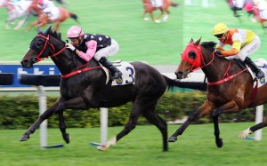 Beauty Legacy surges to victory on his Hong Kong debut at Sha Tin on Sunday. Photos: Kenneth Chan