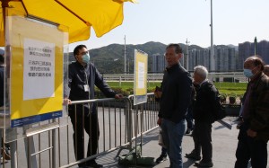 Racing fans are knocked back at the gate at Sha Tin on Monday. Photos: Kenneth Chan