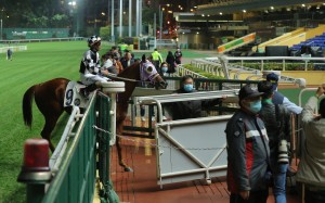 Karis Teetan returns to scale after winning aboard Master Albert in front of empty stands at Happy Valley on Wednesday night. Photos: Kenneth Chan