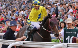 Hugh Bowman and John Moore celebrate Werther’s victory at Sha Tin. Photos: Kenneth Chan
