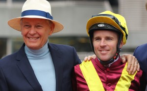 Trainer John Moore with jockey Tommy Berry. Photos: Kenneth Chan