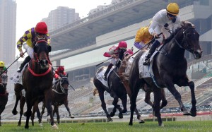 Vincent Ho guides Golden Sixty to victory in the Classic Cup in front of the empty stands at Sha Tin. Photos: Kenneth Chan