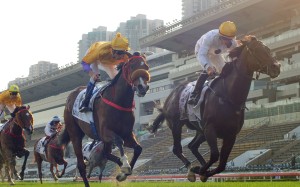 Golden Sixty surges home to win the Hong Kong Derby. Photos: Kenneth Chan