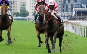 Baltic Whisper motors through the rain-soaked surface to win at Sha Tin on Sunday. Photos: Kenneth Chan
