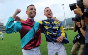 Jockeys Joao Moreira (left) and Zac Purton pose for photographers at the end of 2018-19 season. Photos: Kenneth Chan
