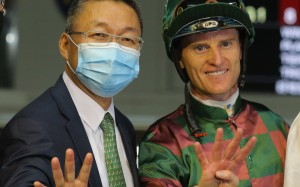 Jockey Zac Purton and trainer Francis Lui celebrate their four-timer at Happy Valley on Wednesday night. Photos: Kenneth Chan