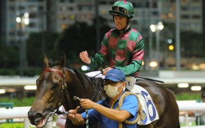 Zac Purton unleashes a big fist pump after completing a four-timer at Happy Valley on Wednesday night. Photos: Kenneth Chan