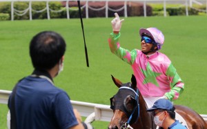 Jockey Joao Moreira throws his whip after a win at Sha Tin. Photos: Kenneth Chan
