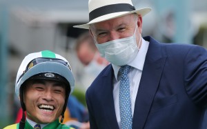 Jockey Keith Yeung and trainer David Hayes celebrate Moneymore’s win at Sha Tin on Sunday. Photos: Kenneth Chan