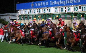 Horses jump for the sixth race at Happy Valley on Wednesday night. Photos: Kenneth Chan