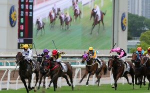 Vincent Ho guides Golden Sixty to victory in Sunday’s Group Three Celebration Cup. Photos: Kenneth Chan