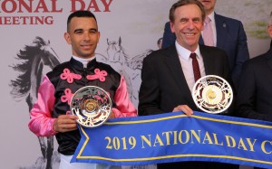 Joao Moreira and John Size pose for photos with their trophies after winning the 2019 National Day Cup with Full Of Beauty. Photos: Kenneth Chan