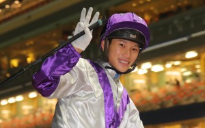 Jerry Chau flashes a smile after completing a treble at Happy Valley on Wednesday night. Photo: Kenneth Chan