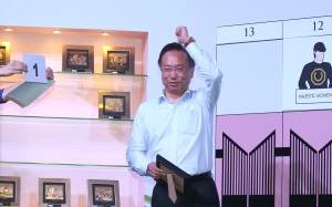 Classique Legend owner Boniface Ho celebrates drawing barrier one in the Kranji Mile last year. Photos: Kenneth Chan